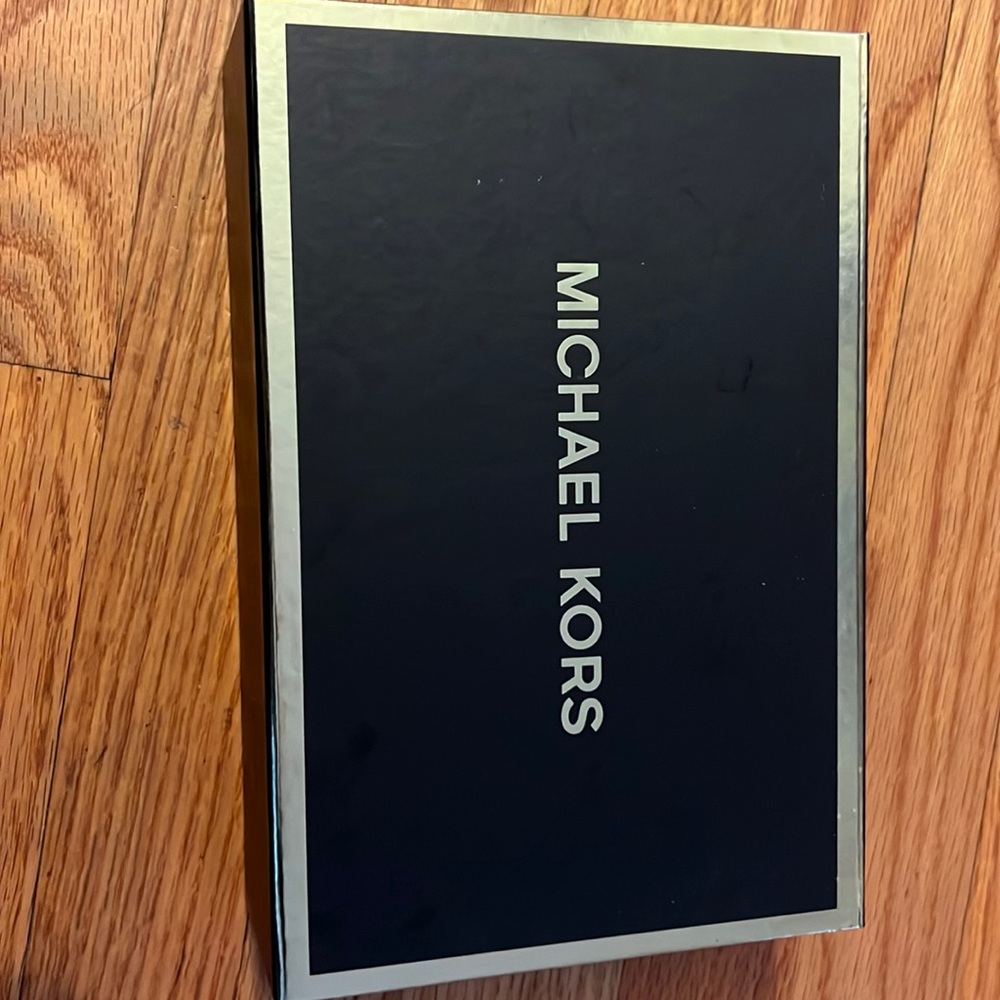 Pink Michael Kors jet travel wallet